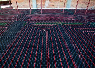 instalación de suelo radiante en sede de Comagi en Santiago de Compostela